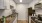 a kitchen with white cabinets