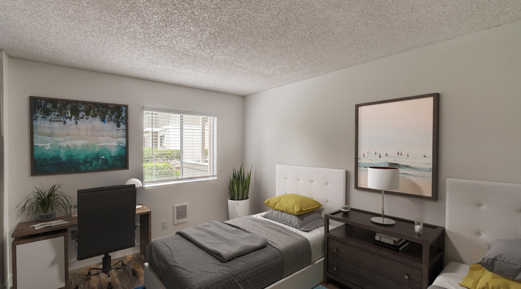 a bedroom with beds and a desk