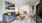 a living room with a tv couch and coffee table