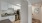 a kitchen with white cabinets